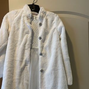 White sparkle dress with faux fur overcoat worn snowflake buttons